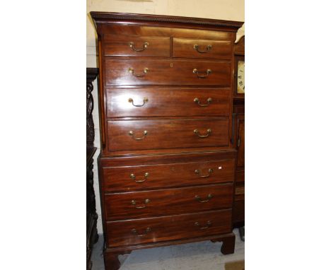 George III mahogany tallboy with a dentil moulded cornice above two short and six long drawers with brass swan neck handles, 