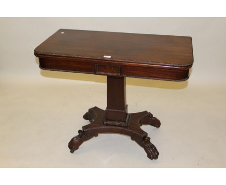 William IV rosewood D-shaped fold-over card table with a gadroon moulded frieze above a rectangular tapering pedestal, quadru