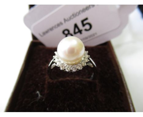 9ct White gold pearl and diamond halo ring 