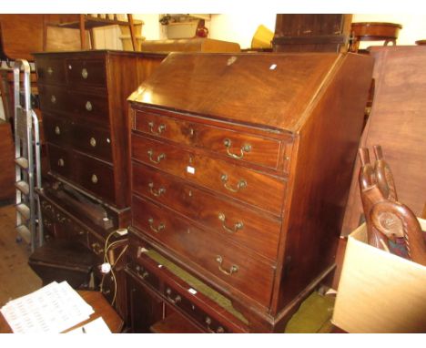 Early 19th Century mahogany bureau, the fall front enclosing a fitted interior above four graduated drawers with original bra