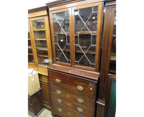 19th Century mahogany and line inlaid secretaire bookcase, the moulded cornice above a pair of astragal glazed doors enclosin