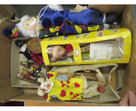 Box containing various wooden dolls,  Pelham puppet of Rupert the Bear in original box, another, the White Rabbit from Alice 