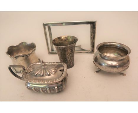 London silver mounted desk calendar frame, together with two silver condiments, a silver napkin ring and a silver (800 mark) 