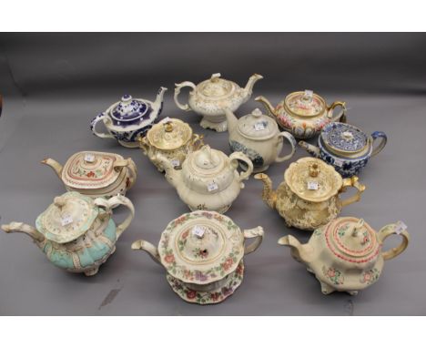 Eleven various 19th Century English teapots together with a covered sucrier including transfer printed and floral  hand print