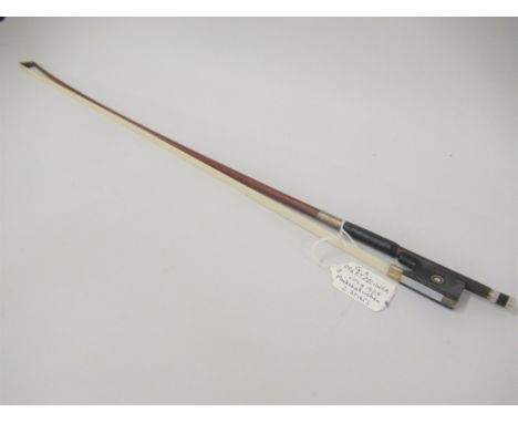 Violin bow by G.A. Pfretzschner, circa 1925 with leather and silver wire grip, mother of pearl inlaid and silver mounted ebon