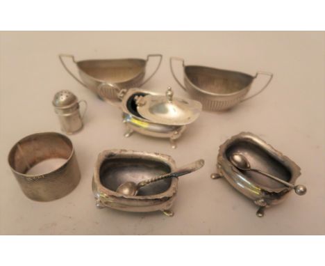 Six various silver condiments, together with a silver napkin ring 