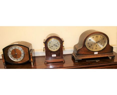 Edwardian mahogany mantel clock having silvered dial with two train movement striking on a gong, together with two oak dome t