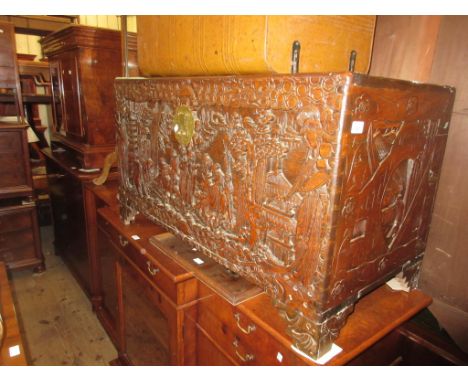 Early to mid 20th Century carved camphor wood trunk with hinged lid, 41.5ins wide x 20.5ins deep x 24ins high 