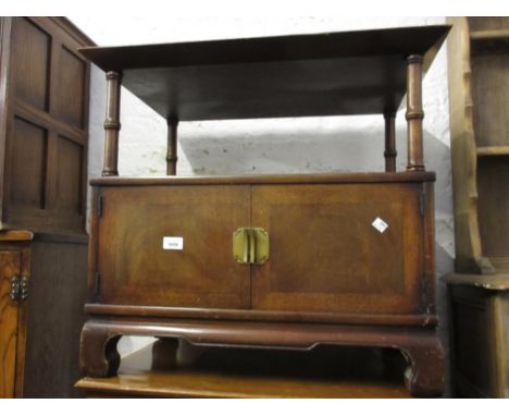 Reproduction mahogany rectangular lamp table with an alcove above two doors together with a reproduction mahogany bow fronted