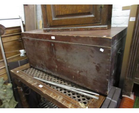 Rectangular stained pine trunk with hinged coverCannot see any woodworm holes but is a little beaten about from use and stora
