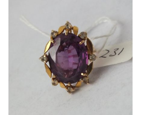 18ct gold and large amethyst set dress ring with diamond points  approx size K 9g inc       