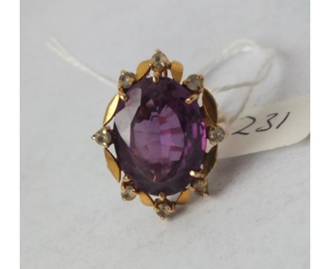 18ct gold and large amethyst set dress ring with diamond points  approx size K 9g inc       