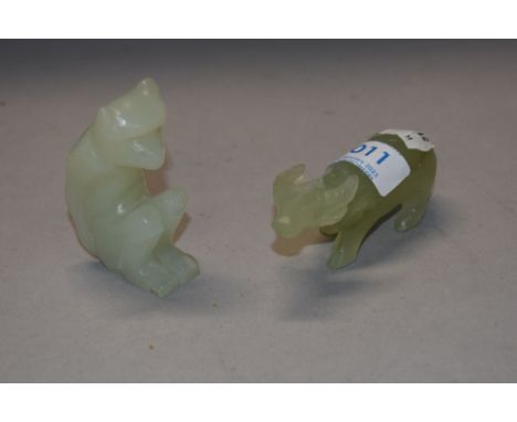 Two pale jade type stone carved figures of an Ox and a Monkey