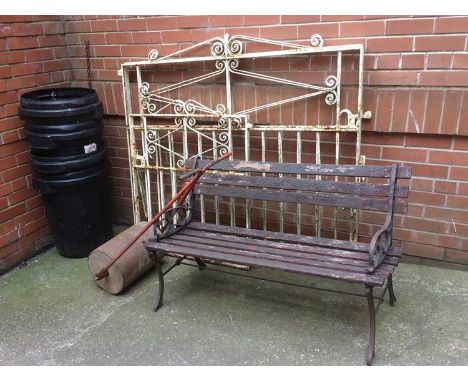 Garden bench, garden roller and wrought iron gates