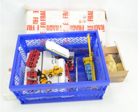 A small group of model haulage and industrial vehicles comprising Conrad yellow/blue articulated truck with 'Wirth' decals, s