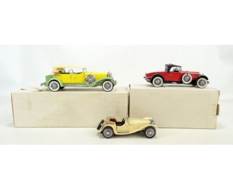 FRANKLIN MINT PRECISION MODELS; three models comprising 1930 Duesenberg J Derham Tourster in yellow/green livery, 1928 Stutz 