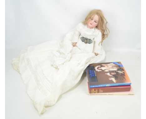 A late 19th century George Borgfelt 'Constance' bisque headed doll with glass open/close eyes, open mouth with four upper tee