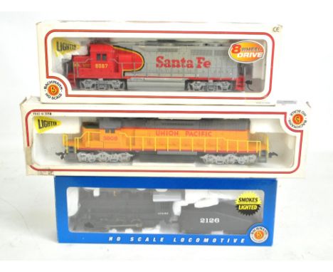 BACHMANN; one steam and two diesel H0 gauge locomotives, 50602 USRA 0-6-0 with smoke and tender (Santa Fe), 67001 SD 40-2 Uni