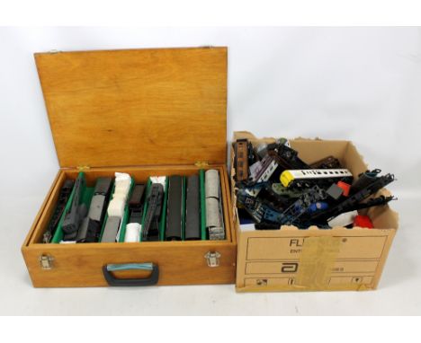 A quantity of loose rolling stock and containers including Lima, Hornby, G&amp;R Wrenn, Kibri, etc. CONDITION REPORT: All pla