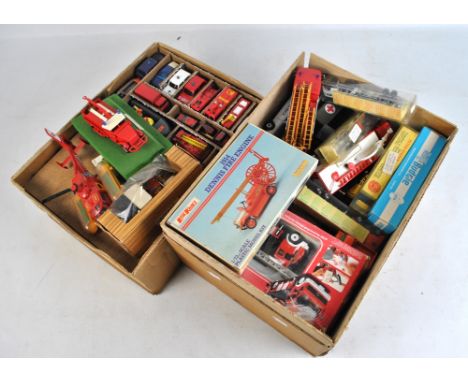 A group of predominantly loose and some boxed model cars and vehicles including two Britains Ltd police and RNLI boats with c