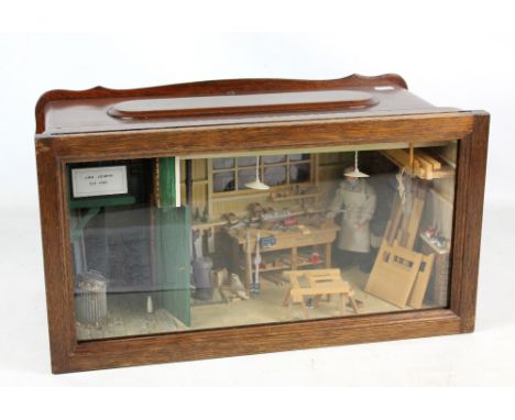 A 'Jim's Joinery' doll's carpentry shop featuring clothed joiner/carpenter, tools, wooden furniture and street entrance to le