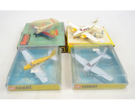 DINKY; two boxed 710 'Beechcraft S35 Bonanza' and 715 'Beechcraft C55 Baron' planes and two further boxed Corgi 1301 'Piper C
