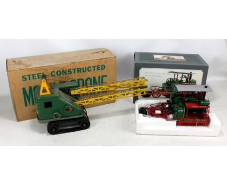 A boxed Marx Toys mobile crane with 'Lumar Contractors' sticker to reverse and instruction sheet, and a boxed Spec Cast Holt 