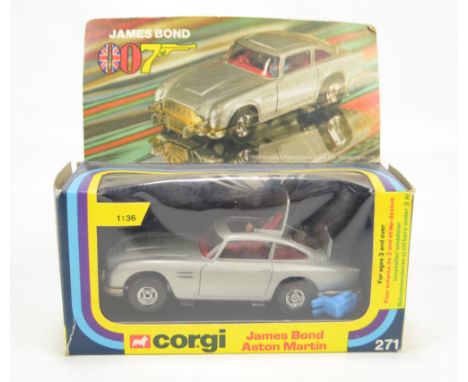 CORGI; a boxed 271 'James Bond Aston Martin' with three figures visible. CONDITION REPORT: Box worn with creases, tear to lef