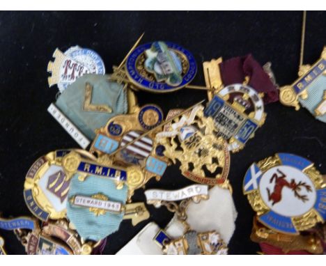 Masonic Interest - a collection of enamel and metal stewards jewel pins, including a paper badge for 1943, the paper token to