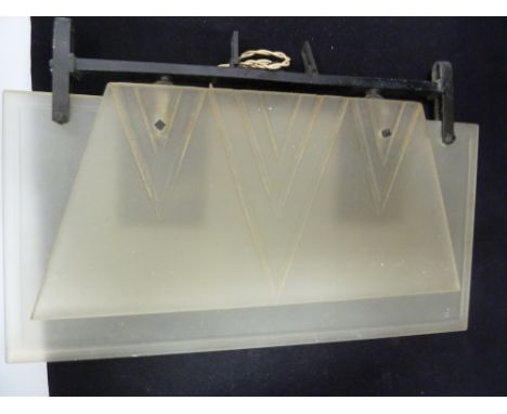 Am Art Deco hanging glass cloakroom light, the glass moulded with geometric motifs, 46cm max
