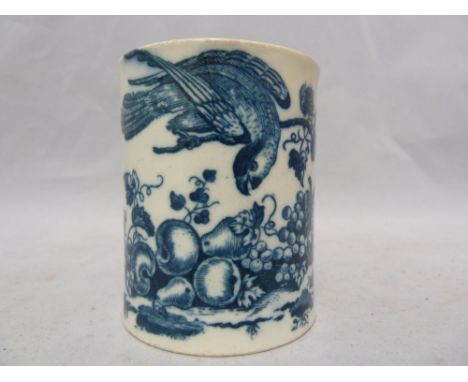 A Caughley porcelain small mug, printed in blue with parrot pecking fruit pattern, c1775, 8cm high