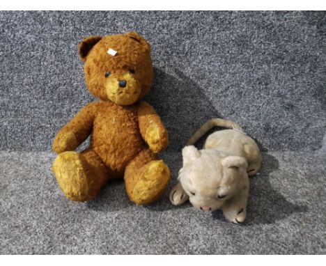 A Steiff tiger cub and a teddy with articulated arms and legs.