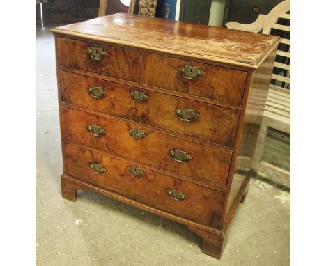 CHEST, George II walnut of two short over three long graduated drawers on bracket feet, 94.5cm W x 91.5cm H x 51.5cm D. (with