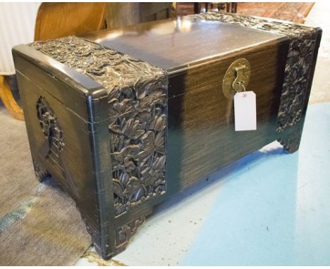 TRUNK, 20th century Chinese camphorwood with carved hinged top and interior lattic tray, 53cm H x 101cm W x 55cm D.