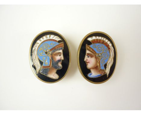 A pair of late 19th Century gilt metal dress studs, enamelled with the profile portrait of a male and female classical Greek 