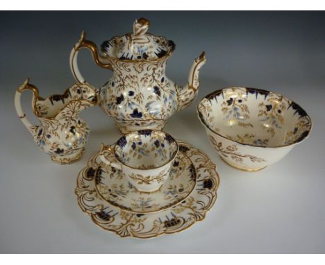 A Rockingham porcelain tea and coffee service, comprising twelve tea cups with corresponding coffee cups and saucers, two san