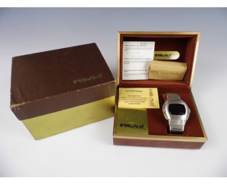 A 1970s Pulsar model 3100 digital wrist watch in original packaging with papers