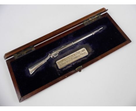 An Edwardian silver model of a Lee Enfield Rifle, in fitted presentation display case with plaque engraved Lanarkshire Imperi