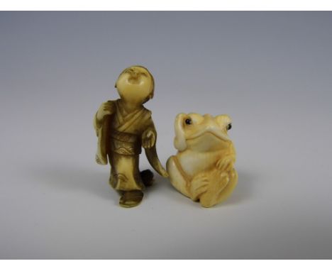 A signed and very small Japanese ivory netsuke modelled as a frog, together with a small okimono modelled as a young boy