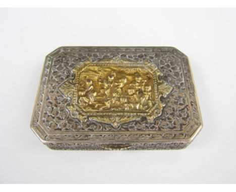 An 18th Century style white metal snuff box, of rectangular section with canted corners, the hinged lid centred by a gilt bar