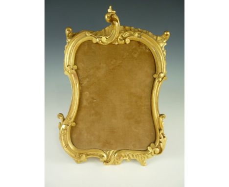 A Rococo gilt gesso framed brooch display stand with easel back, 30 x 43 cm 