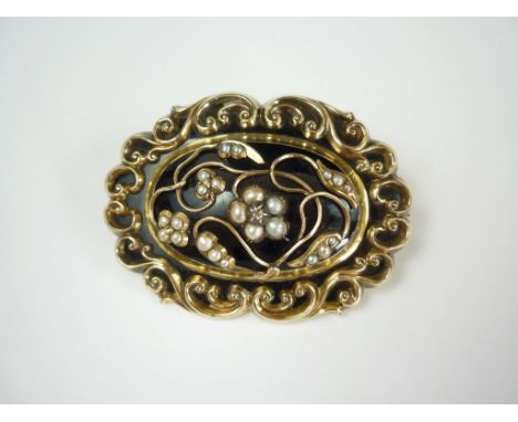 A substantial Victorian diamond, pearl and black enamel hairwork mourning brooch, of domed oval section within a cusped C scr