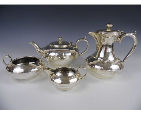 A James Dixon & Sons electroplate tea service, comprising tea pot, hot water, sugar and milk, each piece of compressed ovoid 