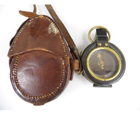 A First World War British Army issue prismatic marching compass in leather case