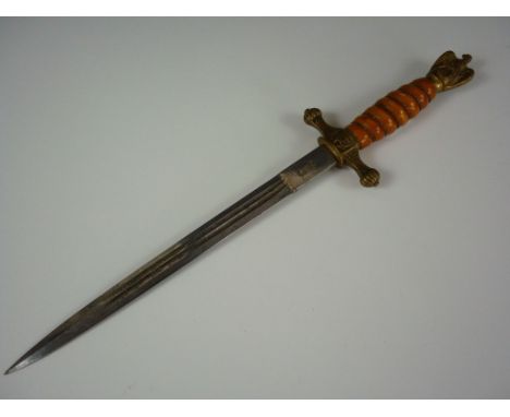 A German Third Reich Kriegsmarine officer's dagger, the blade etched in a tall ship design, (scabbard lacking)