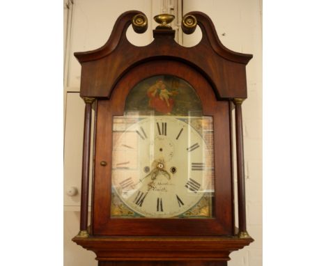 A Victorian mahogany cross-banded oak long case clock by William Matthews of Penrith, having a painted arched face, the trunk