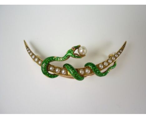 A Victorian pearl, ruby, enamel and high-carat yellow-metal crescent moon brooch, the crescent channel set with eighteen grad