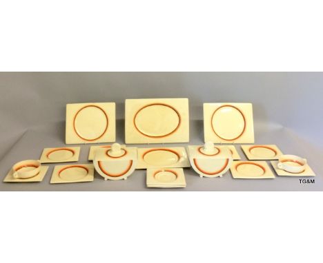 A Clarice Cliff Biarttz Art Deco part dinner set to include two tureens, 1 platter, 3 dinner plates, 6 side plates, 5 soup pl