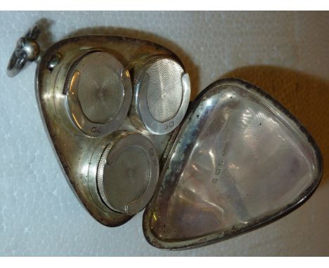 Silver triple sovereign case with engine turned decoration