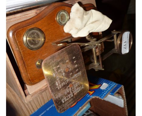Set of postal scales in wooden box with associated weights 